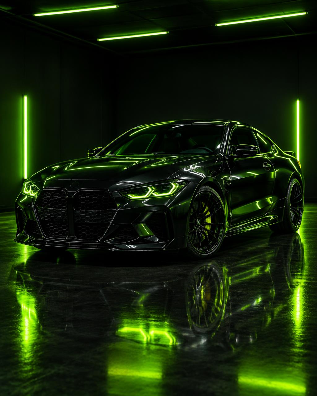 Freshly detailed matte black coupe under neon studio lighting